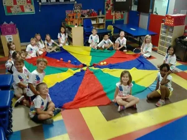 Preschool Students Smiling At the Camera — Sarasota, FL — Shining Stars Learning Center