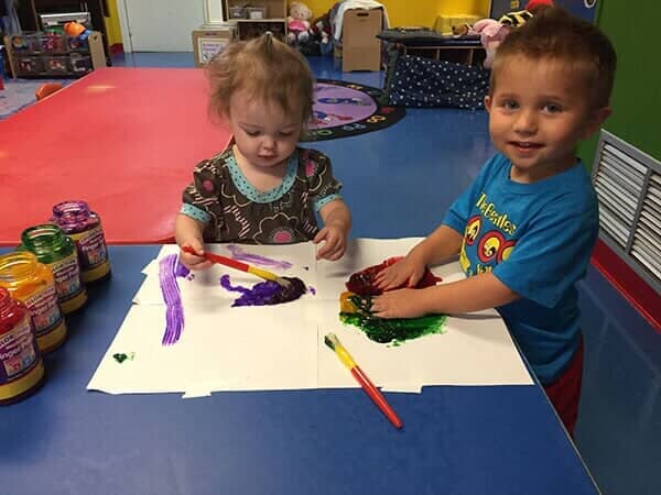 Toddlers Playing Color Paint — Sarasota, FL — Shining Stars Learning Center