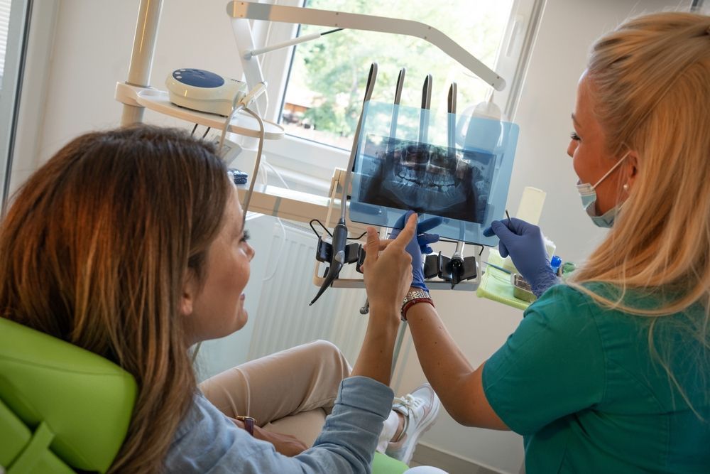Brookside Dental Associates dentist explaining treatment options to a patient in Redlands CA
