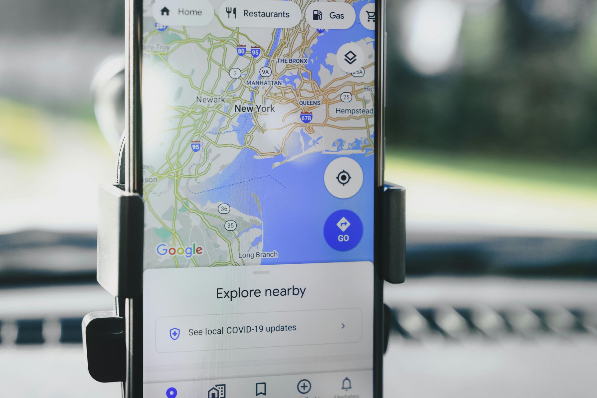 A cell phone is displaying a map on the screen.