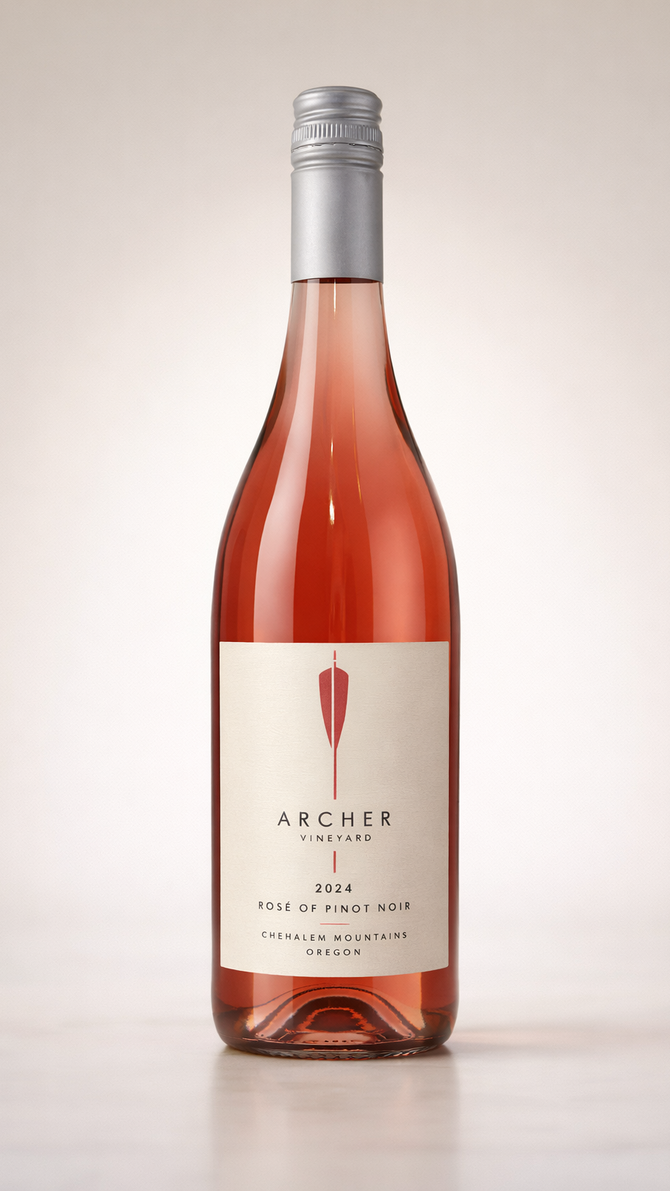 Rosé wine bottle with silver cap and cream label, standing upright on a plain light background