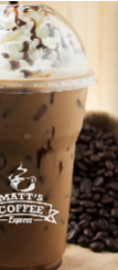 Iced coffee in a clear cup with whipped cream, beside coffee beans and Matt’s Coffee Express logo