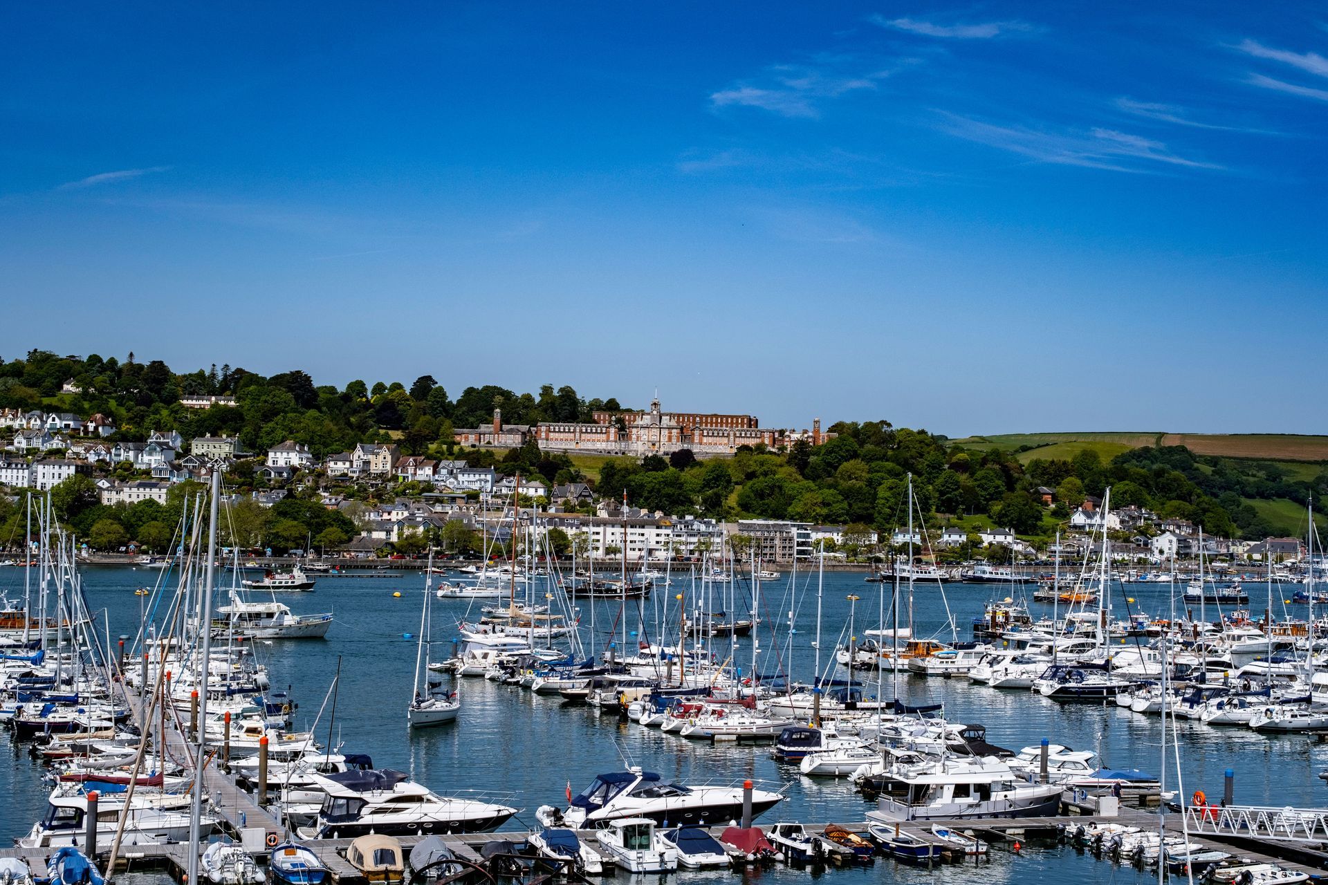 Kingsbridge estuary with boats and Devon town