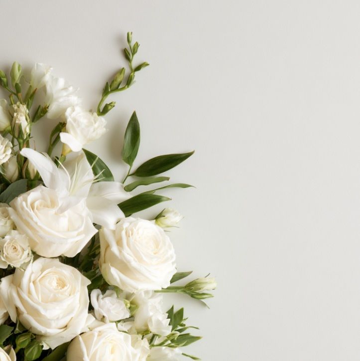 White memorial flowers representing cremation services in Broken Arrow, OK.