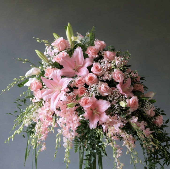 Pink memorial flowers representing cremation services in Tulsa, OK.