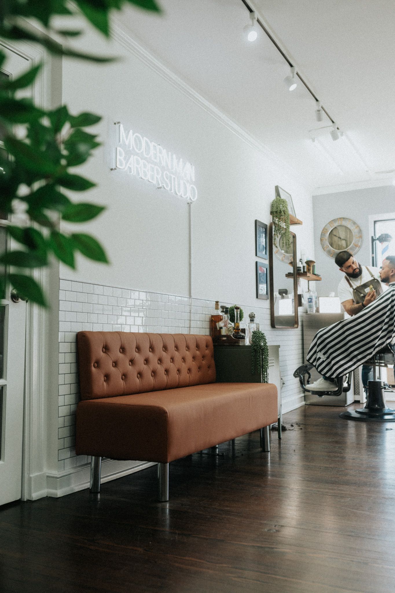 Client getting a clean fade and beard lineup at Modern Man Barber Studio in Long Branch, NJ.