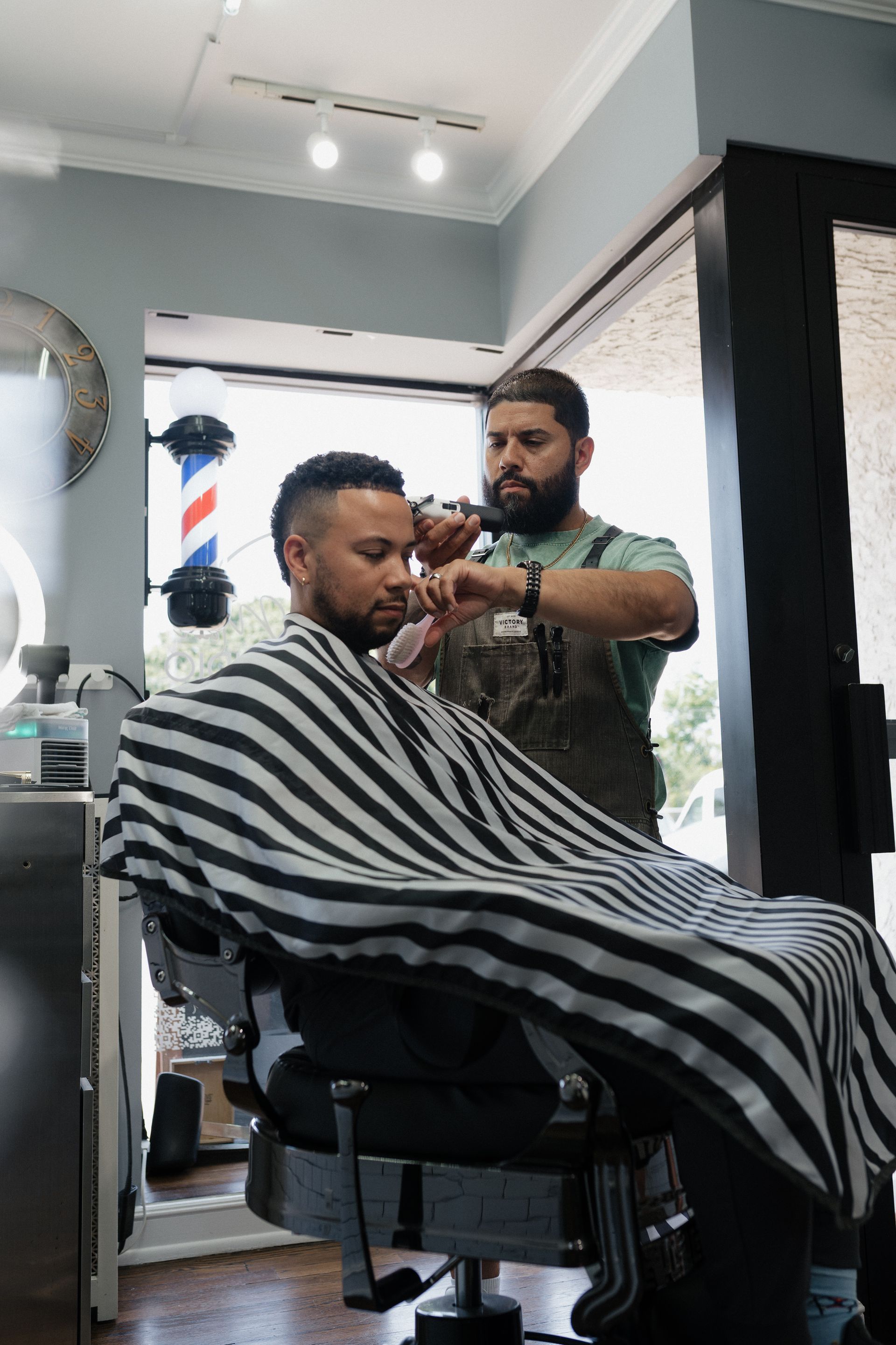 Client getting a clean fade and beard lineup at Modern Man Barber Studio in Long Branch, NJ.