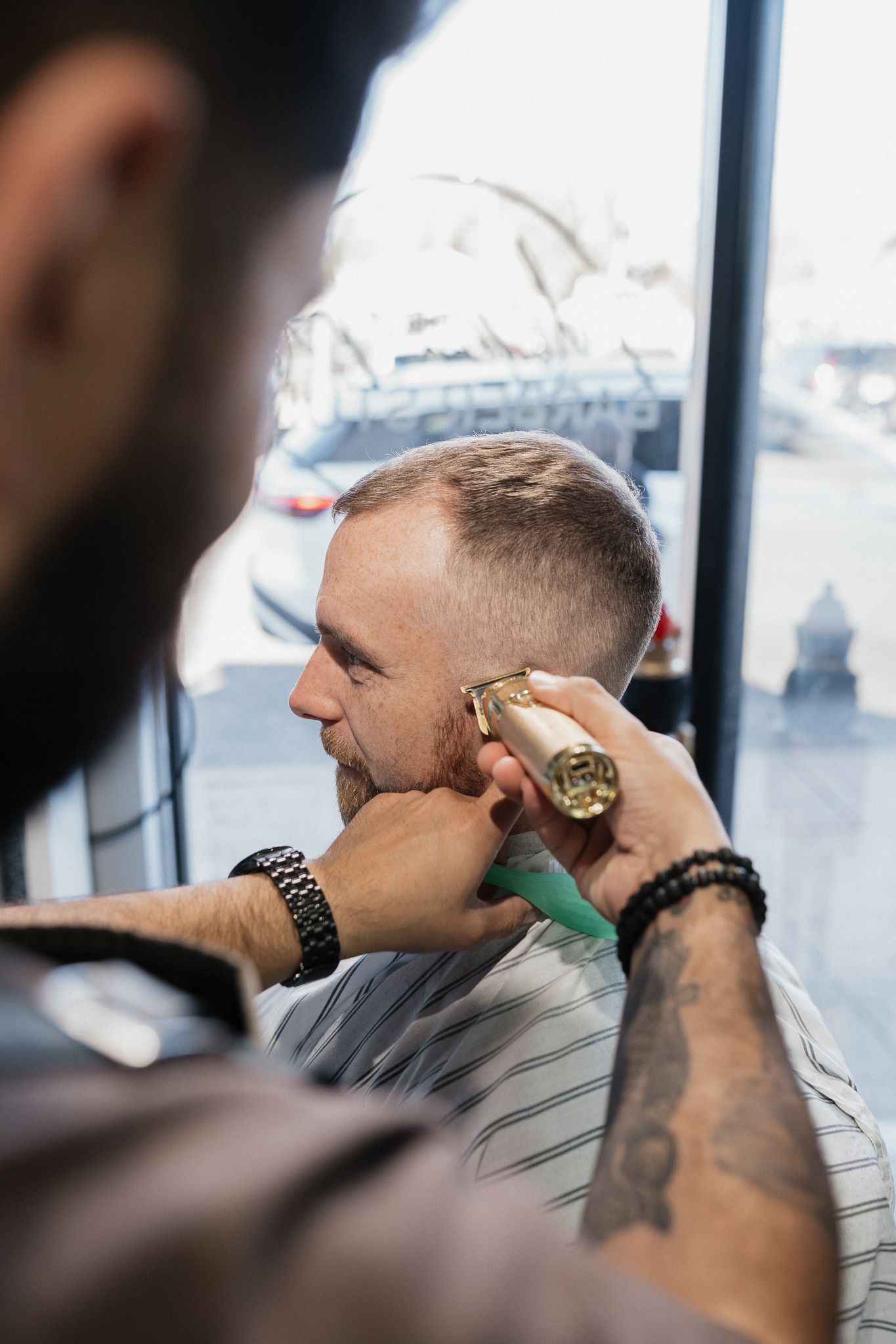Client getting a modern fade and beard lineup at Modern Man Barber Studio in Long Branch, NJ.