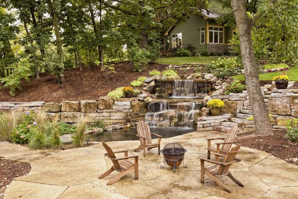 Serene garden waterfall as a hardscape feature in Tulsa - Tulsa, OK - Outdoor Orchestrators