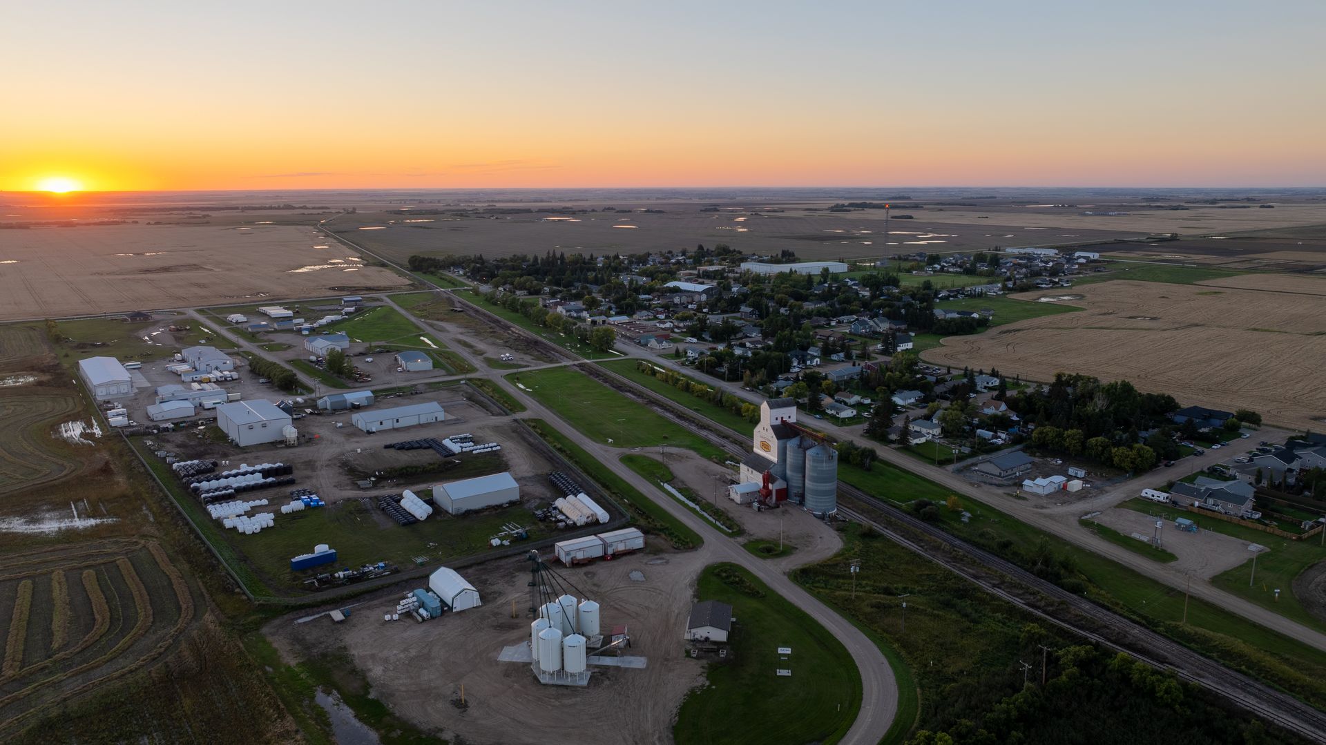 Aberdeen from the southeast at sunset, with its commercial businesses and grain elevator