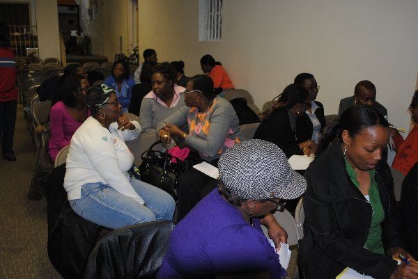 Eastchester Church of God. group of people are sitting in a room talking to each other