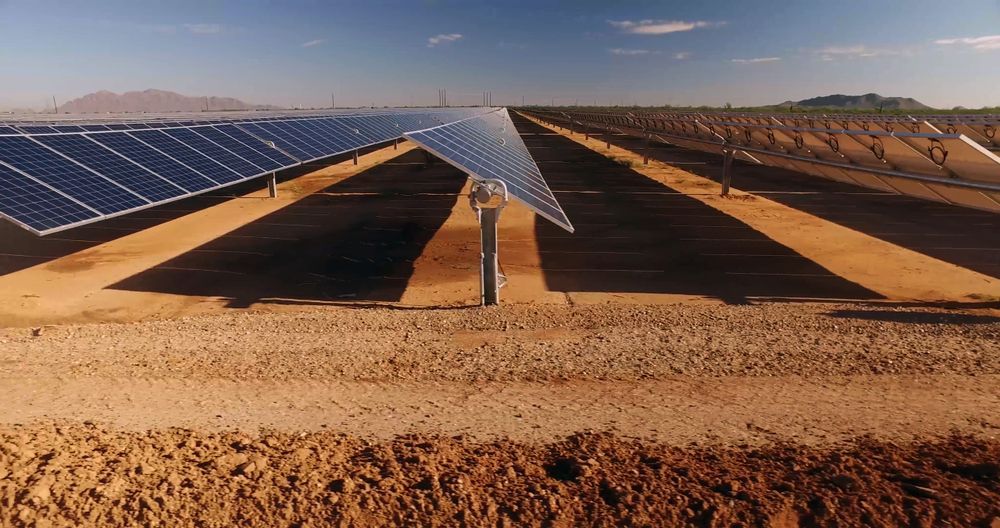 Solar Panels in Rows on a Dirt Field — Big Electrics in Redlynch, QLD