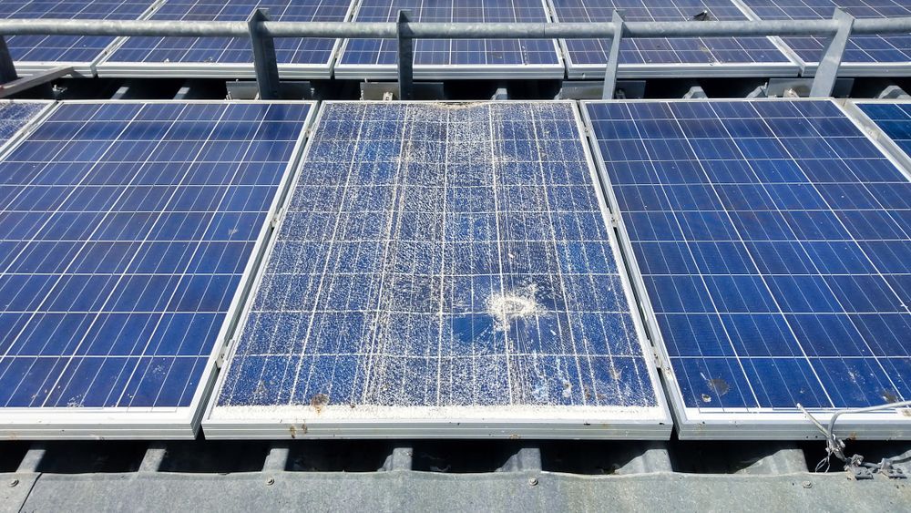 Solar Panel Array With a Damaged Center Panel — Big Electrics in Mareeba, QLD