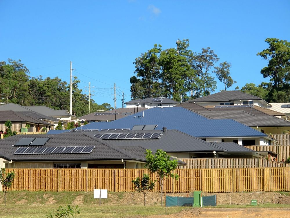 Houses With Solar Panels on Rooftops — Big Electrics in Redlynch, QLD