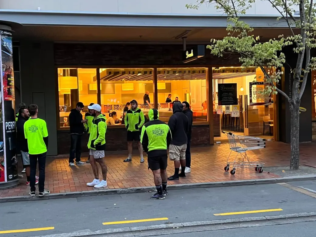 card roofing team in highlighter uniform