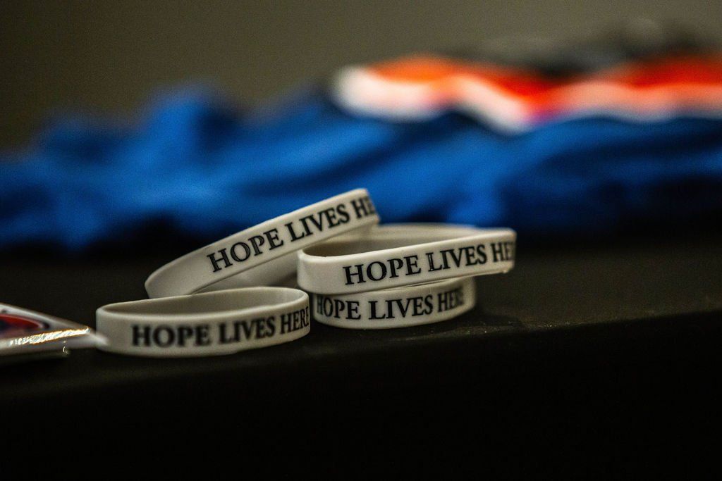 White rubber wristbands with the text 