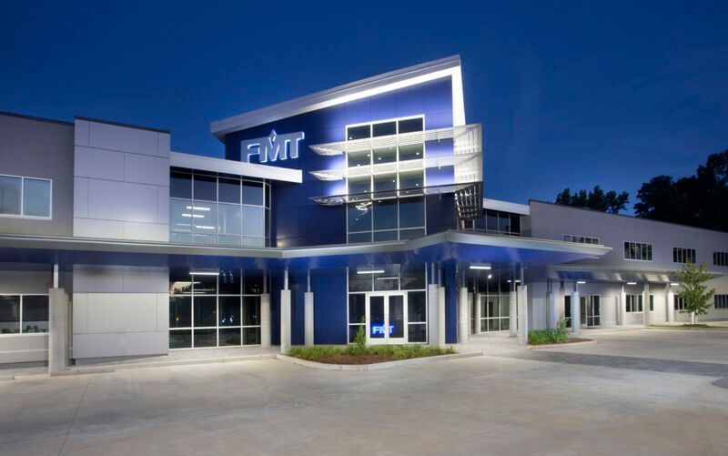 A large building with the word fwt on it