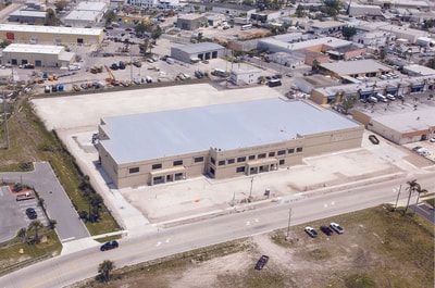 An aerial view of a large building in a city