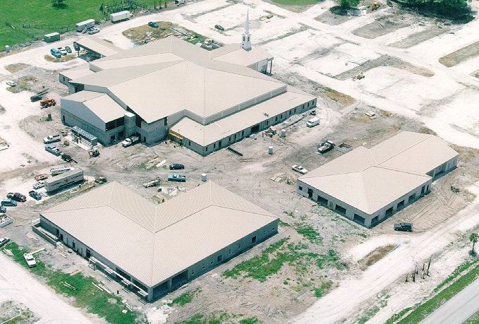 An aerial view of a large building under construction