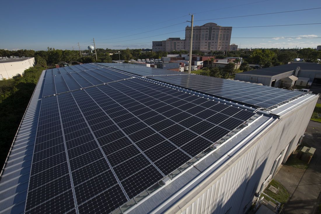 A roof with a lot of solar panels on it
