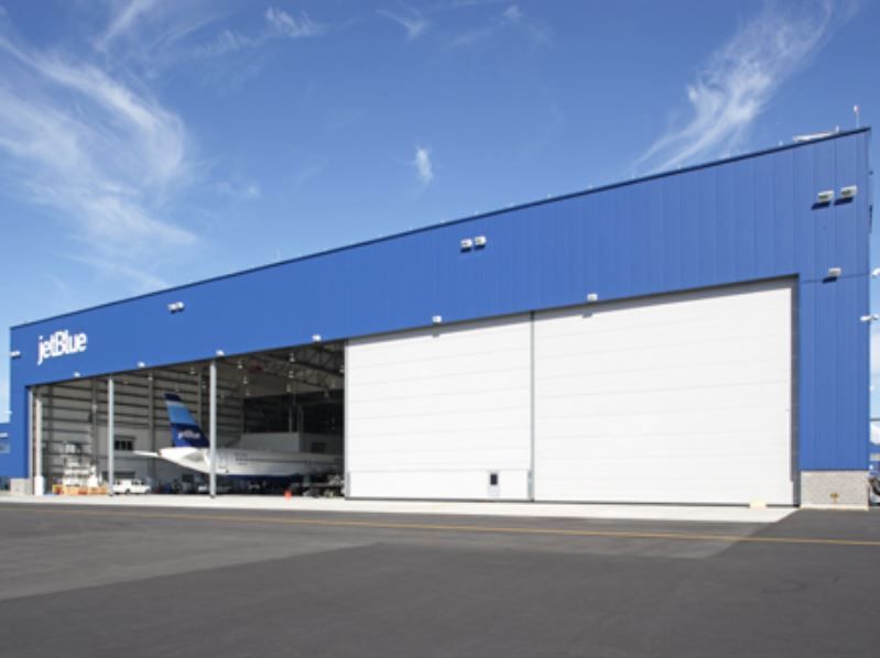 A large blue building with jetblue written on it