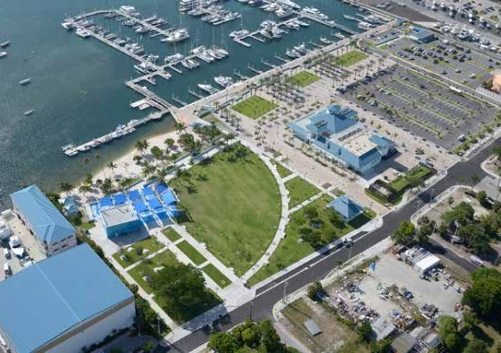 An aerial view of a marina with boats and buildings