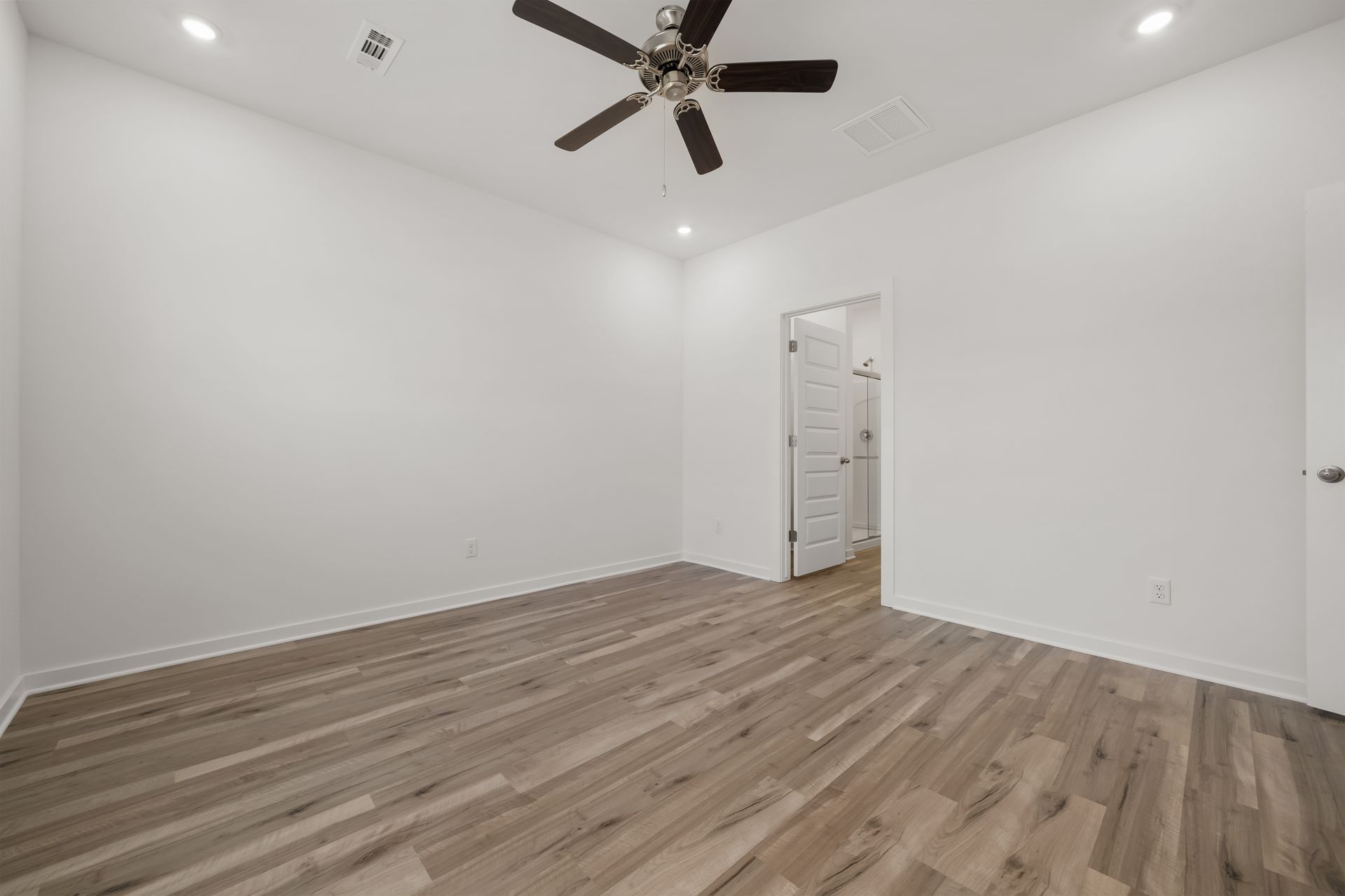 Upstairs secondary bedroom with closet