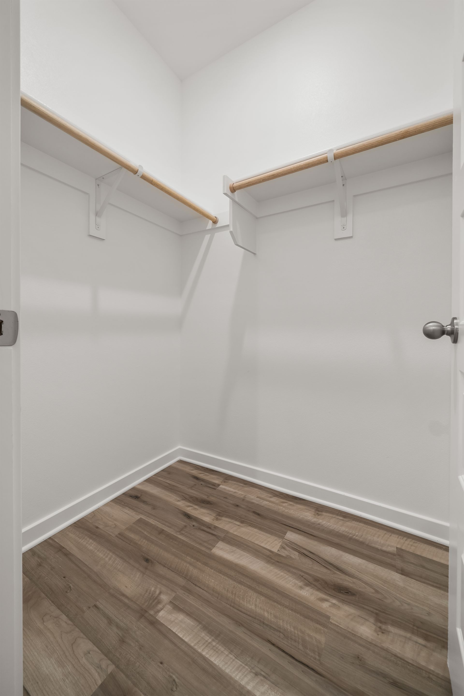 Spacious primary bedroom walk-in closet