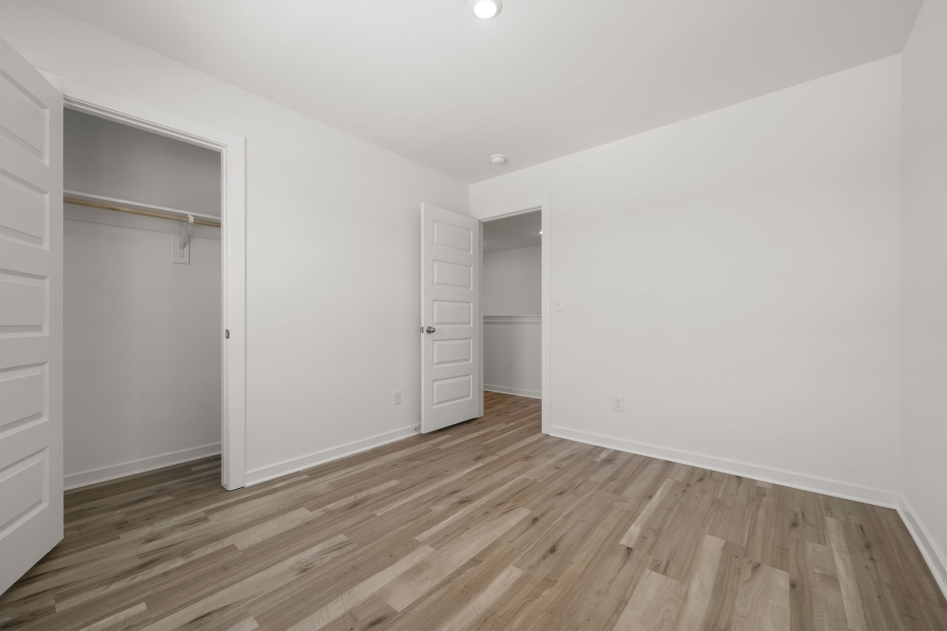 Upstairs third bedroom with closet
