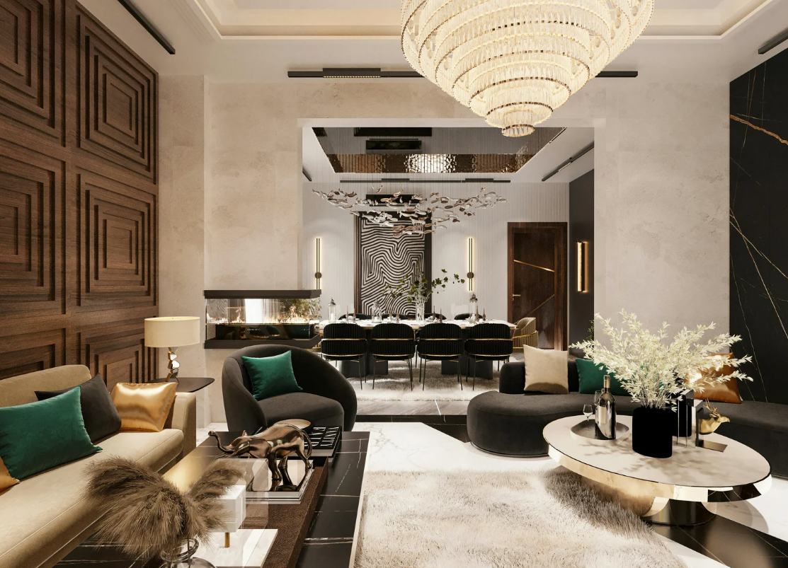 Luxurious living room with modern decor; wood paneling, velvet furniture, and chandelier.