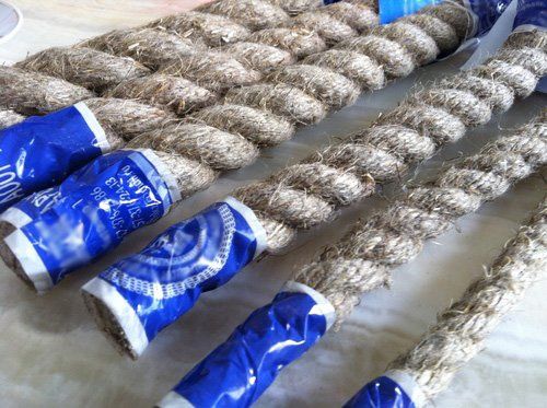 A bunch of ropes are wrapped in blue plastic