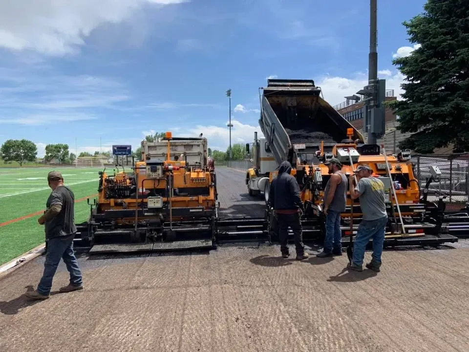 asphalt paving contractors working
