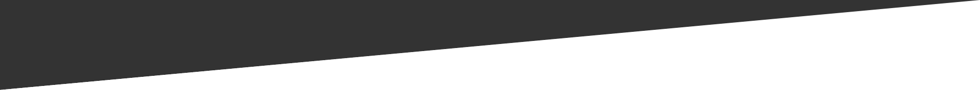 A close up of a piece of black paper on a white background.