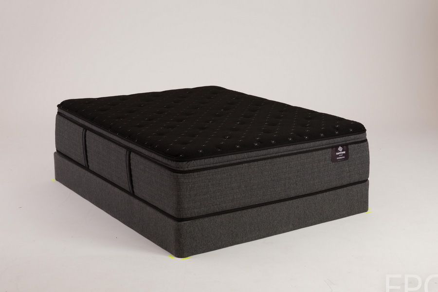 Black mattress and box spring on a white background.