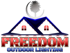 Freedom Outdoor Lighting logo with house roof, palm tree, and red text