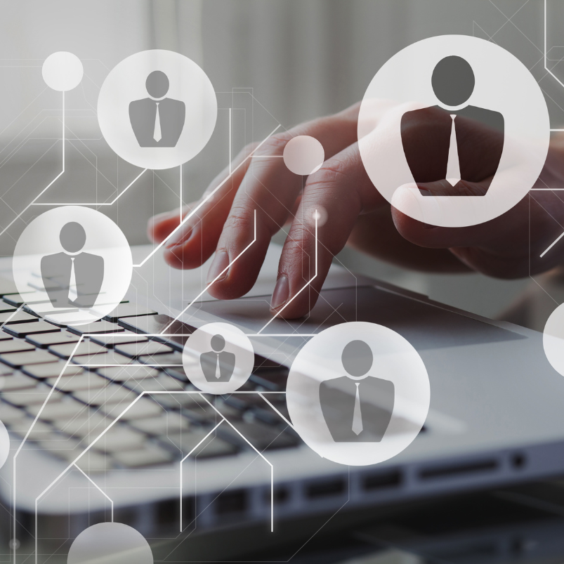 A person is typing on a laptop with icons of people in circles