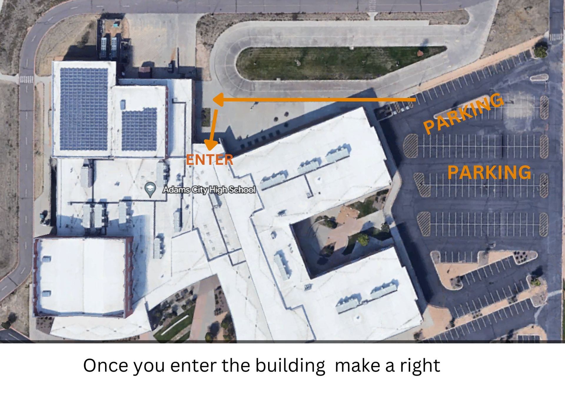 Satellite image of Adams City High School parking lot and entrance