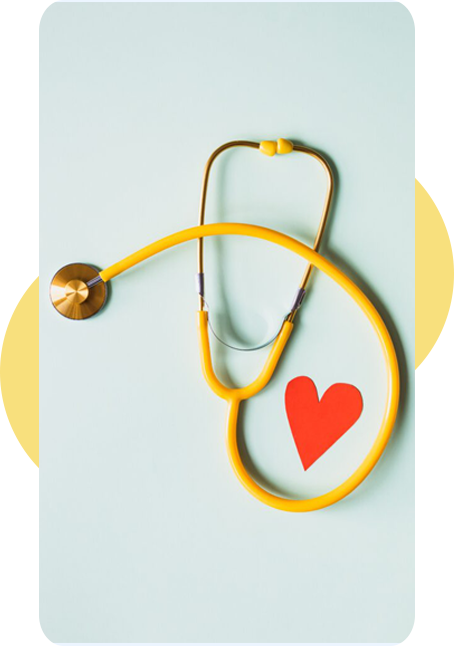Yellow stethoscope with a red heart on a pale blue background
