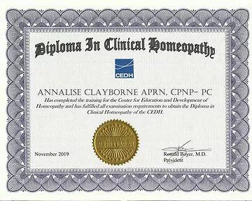 Diploma in Clinical Homeopathy certificate with ornate gray border and gold seal