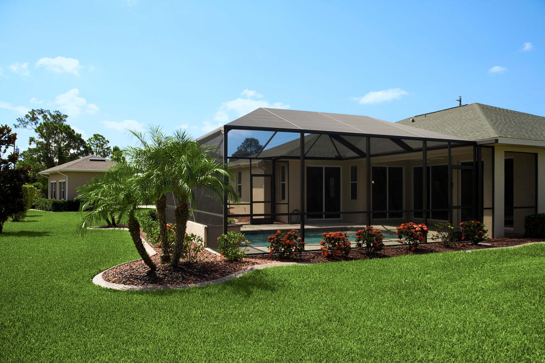 Nice and fancy house with flowers and pool — Leesburg, FL — Aluminum Contractors Inc