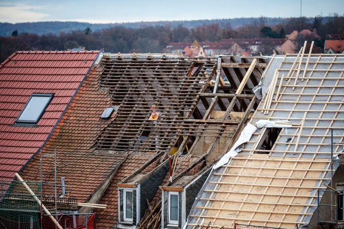 A roof that is partially covered and the roof truss has already been replaced