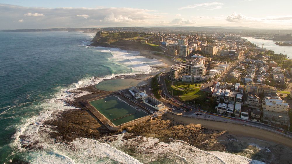 Aerial View of Newcastle Ocean Baths and Cityscape — Blue Chip Bookkeeping In Newcastle, NSW