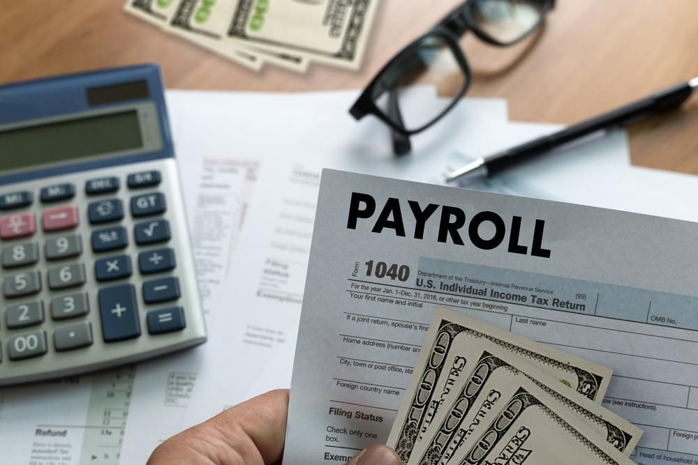 Blue Payroll Binder On A Weekly Time Sheet — Blue Chip Bookkeeping In Maitland, QLD