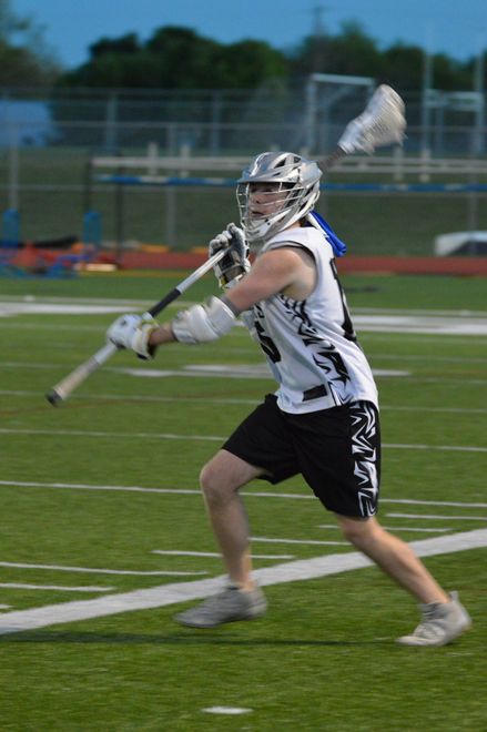 STP Lacrosse Player passing