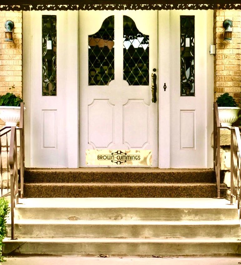a white door with a sign on it that says brooklyn things