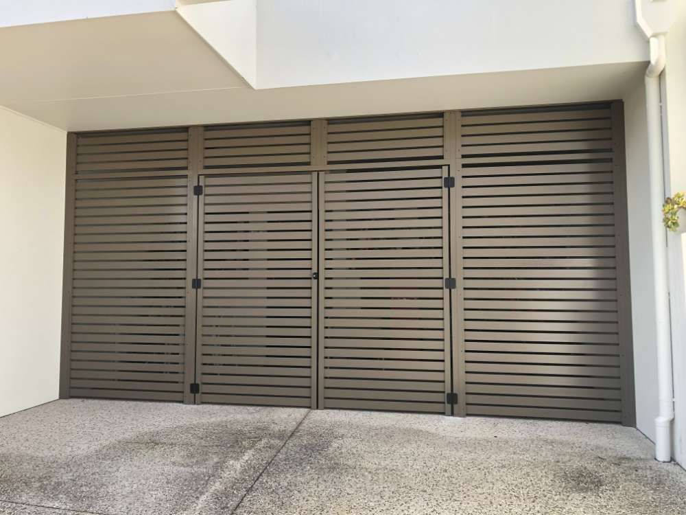 A Garage Door With A Lot Of Slats On It — Homemakers Lifestyle In Maroochydore, QLD