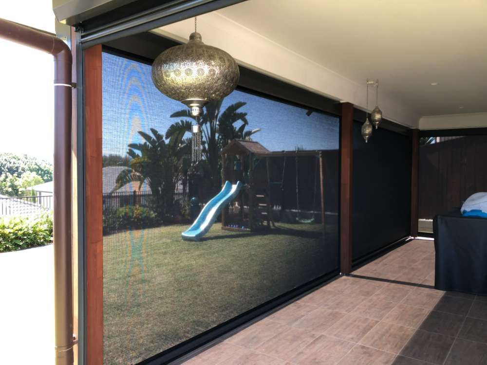 There Is A Slide In The Backyard Behind A Screen Door — Homemakers Lifestyle In Maroochydore, QLD