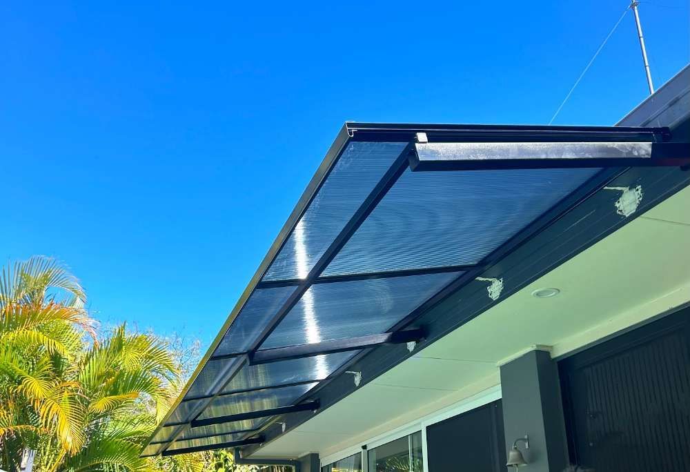 Green Polycarbonate And Steel Structure Awning — Homemakers Lifestyle In Maroochydore, QLD