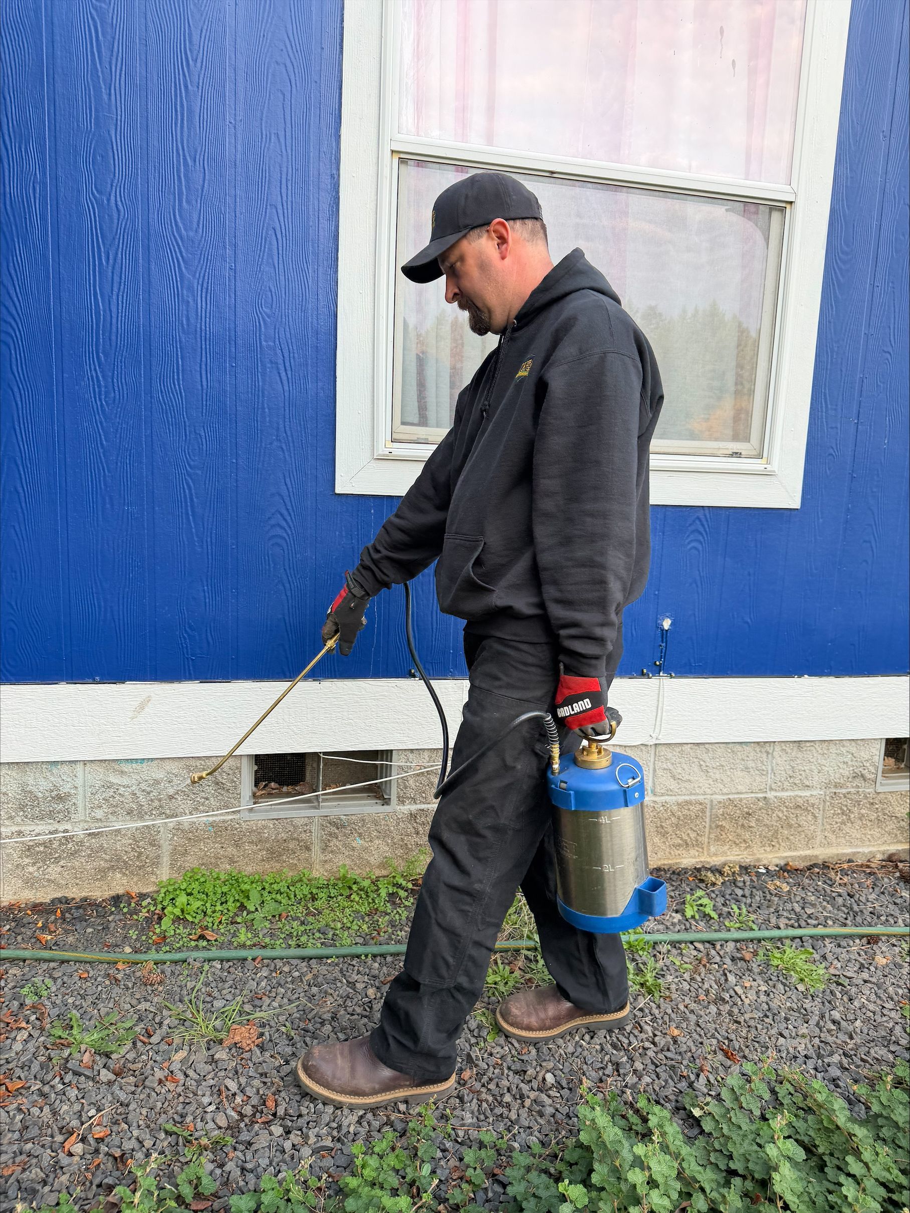 Trevor Korr inspecting a home foundation in the Willamette Valley.