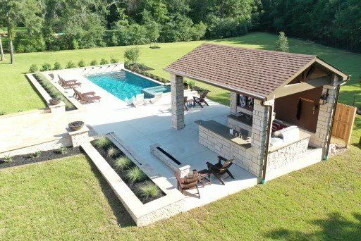 backyard outdoor kitchen and pool